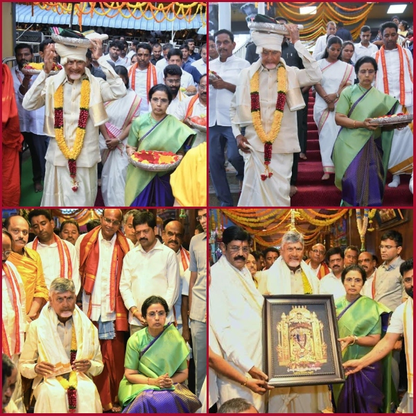 The CM couple offered silk robes to Goddess Durga